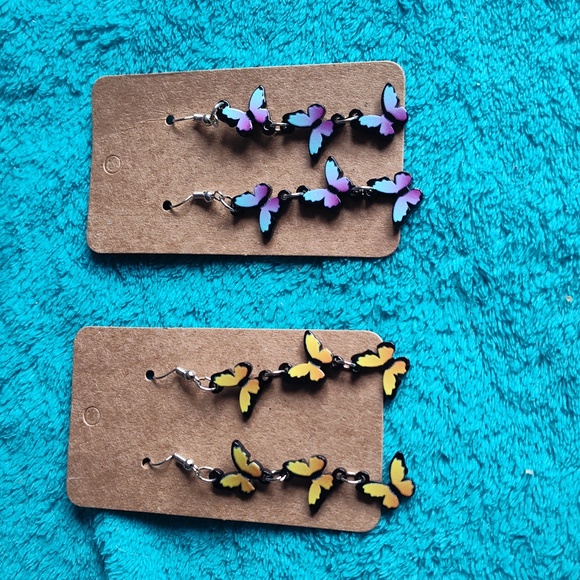 Jewelry - Two sets of butterfly dangling earrings